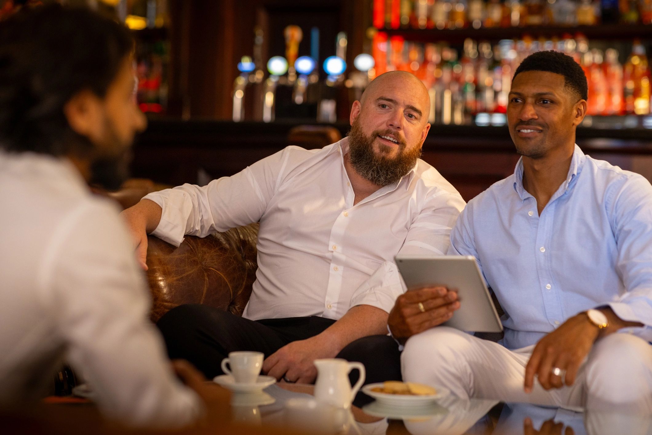Professionals meeting in a lounge setting