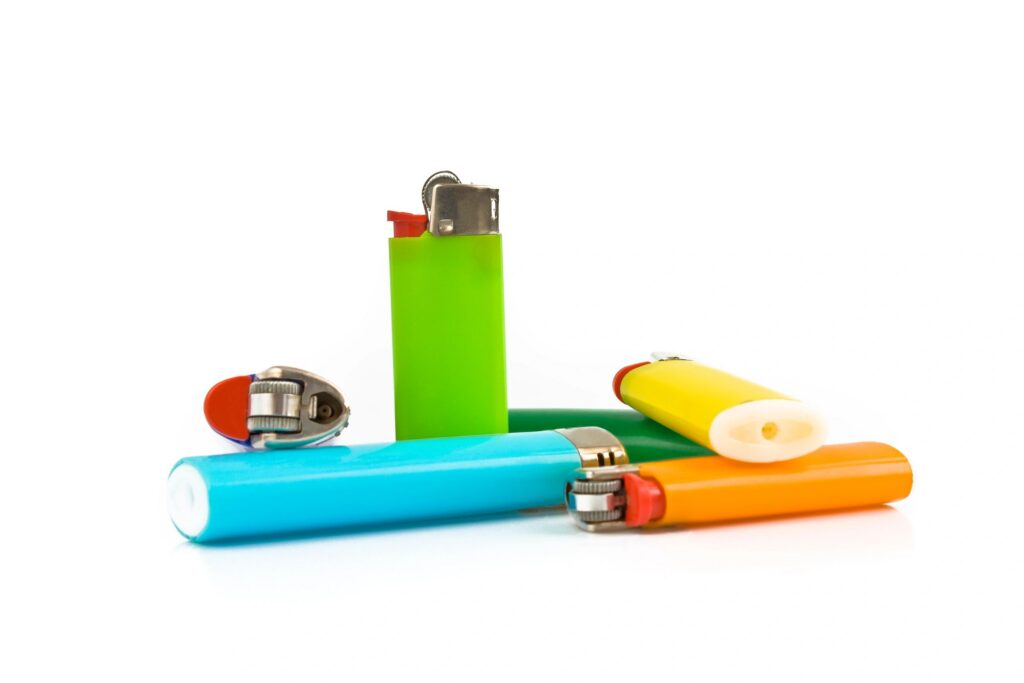 Colored lighters isolated on white background
